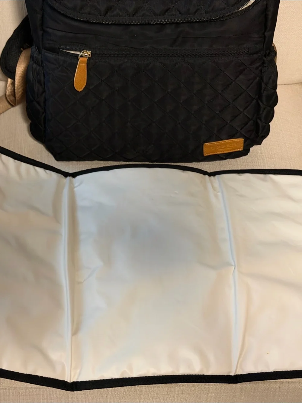 Quilted Black Women's Backpack with Tan Trim Accents